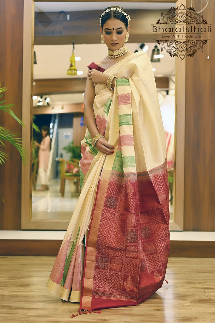 Cream Color Pure Silk Sambalpuri Saree with Red Pallu and Temple Border